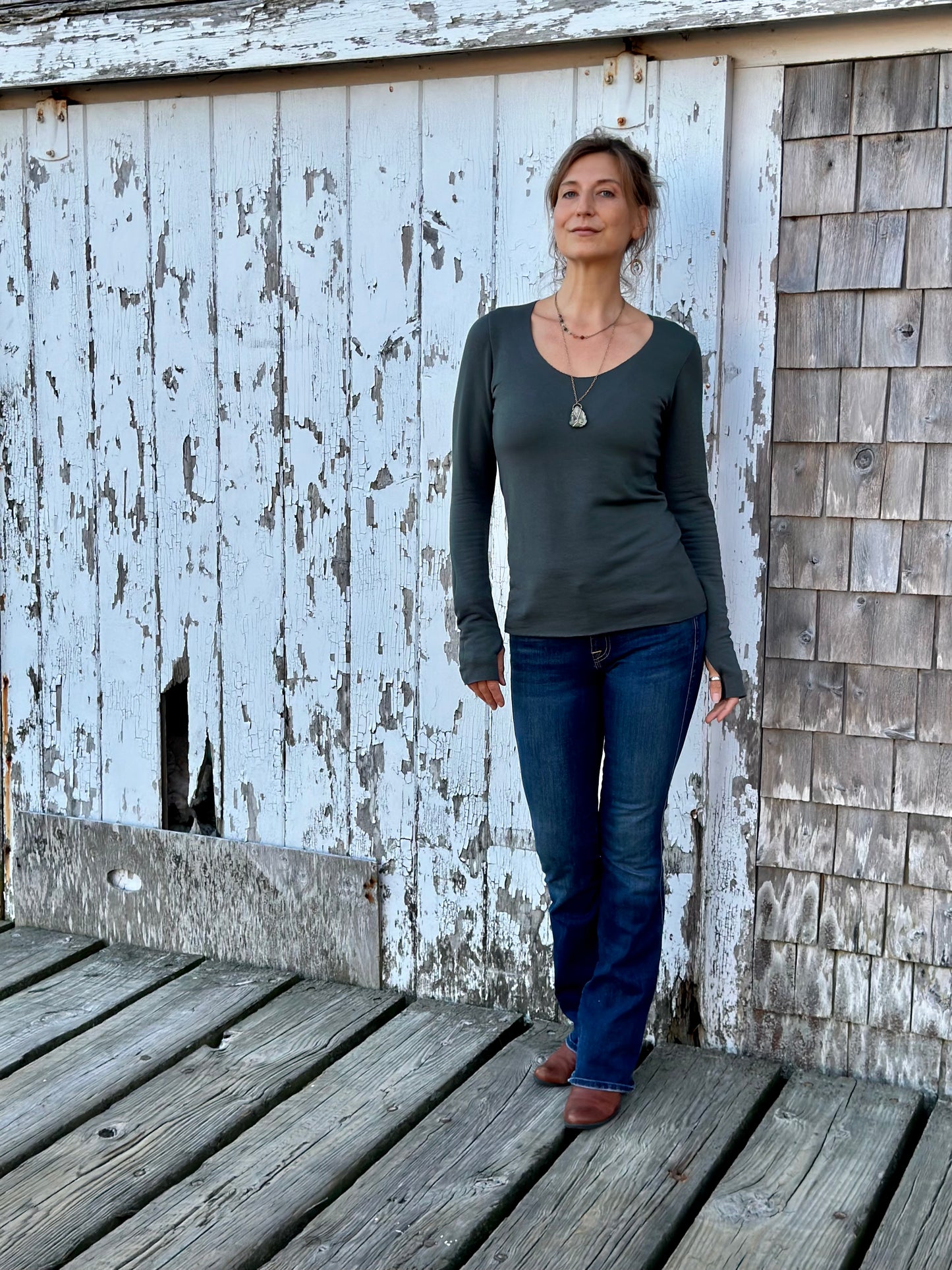 scoop neck long sleeved top with thumb holes in sea spruce